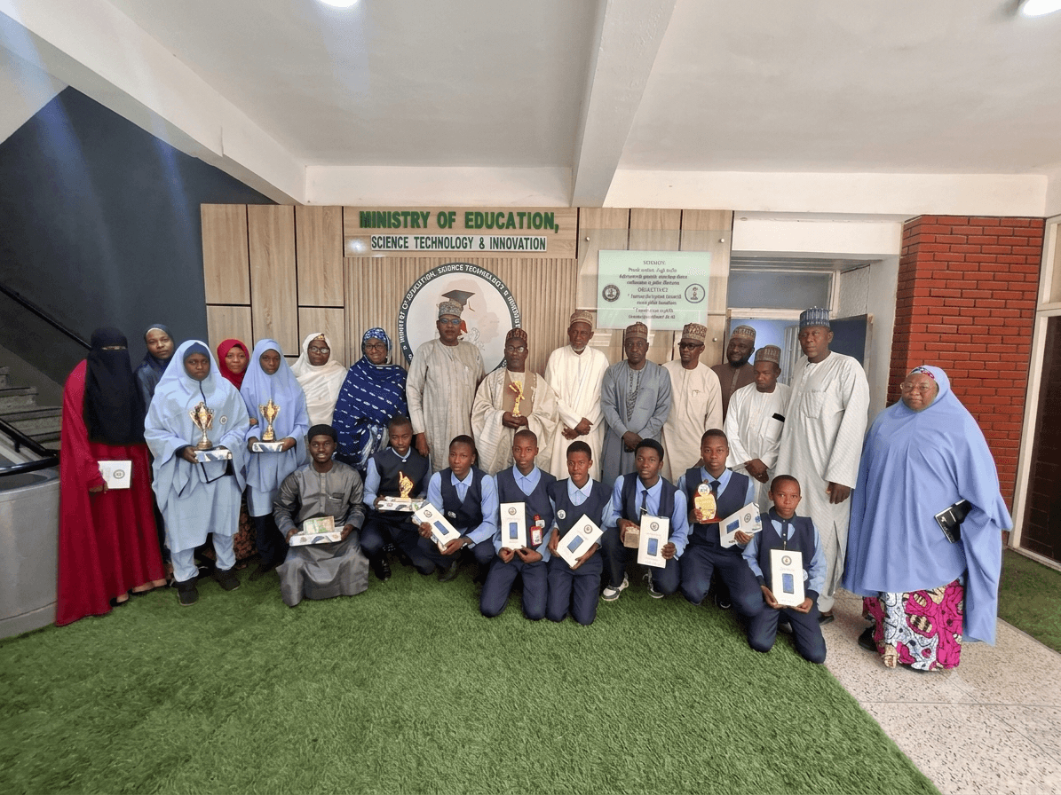 Quran memorisation session with students and teacher